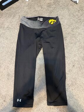 Under Armour Black Capri Leggings with Gray Patterned Waistband and Yellow Logo